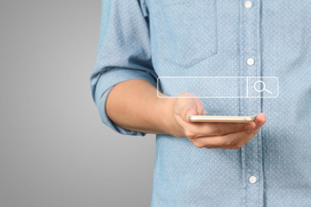 Touch screen smartphone in a handの写真素材