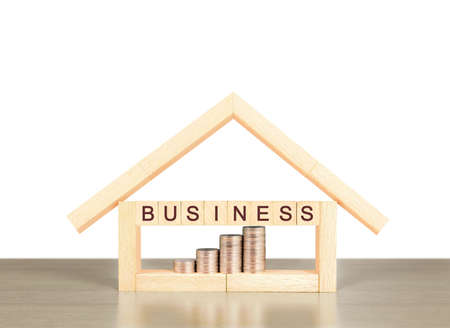 Mortgage concept by house from in hand の写真素材