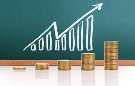graph coins stock finance and business concept