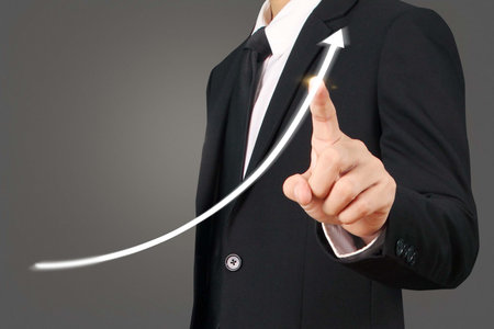 Investment concept,hand with stock financial chart symbols coming from hand
