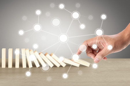 Stopping domino concept , business solutionの写真素材