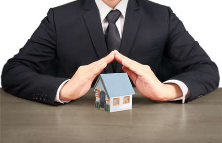  hand holding house ,home real estate agentの写真素材