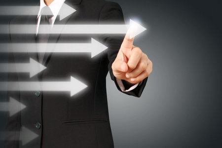 businessman with financial symbols coming from hand ,touch chart stockの写真素材