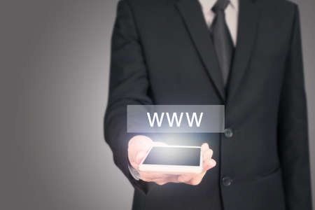 hand holding smartphone deviceの写真素材