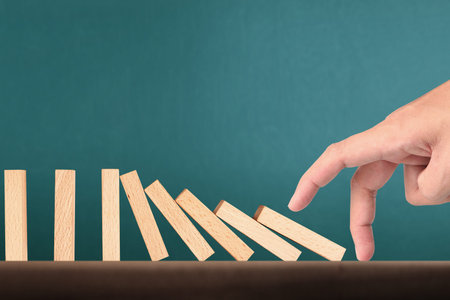 stop a dominoes continuous toppled