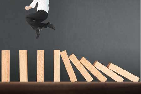 stop a dominoes continuous toppledの写真素材