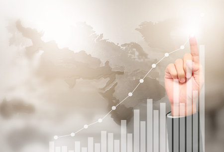 Businessman plan graph growth and increase of chart positive indicators in his businessの写真素材
