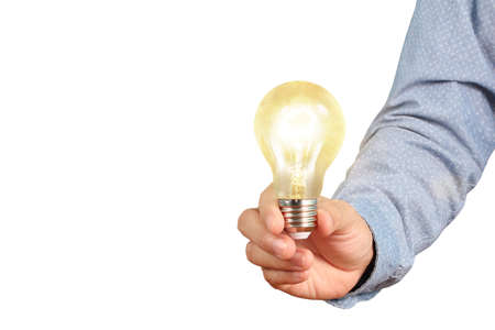 hand holding a light bulb with energyの写真素材