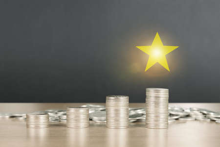 Coins stacked on each other in a different positionsの写真素材
