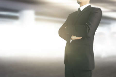 Handsome man in a black suitの写真素材
