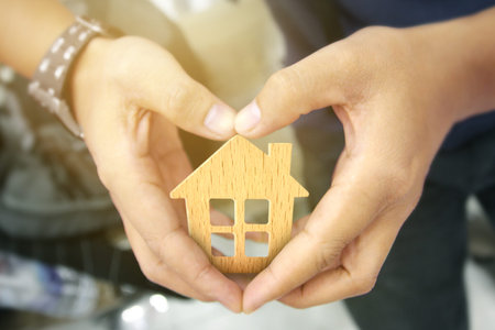 Mortgage concept by house from in a handの写真素材