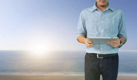 Businessman using digital tablet in a handの写真素材