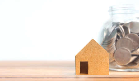 Property investment and house mortgage financial concept money coin stack business home ideaの写真素材