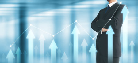 Businessman plan graph growth and increase of chart positive indicators in his businessの写真素材
