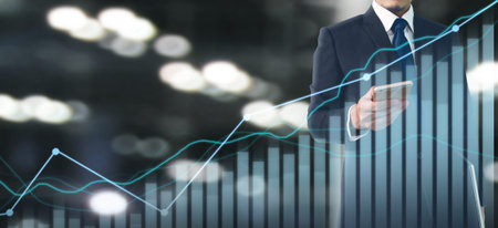 Businessman plan graph growth and increase of chart positive indicators in his business.smartphone...