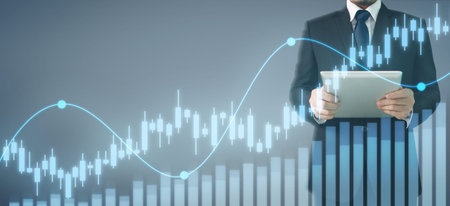 Businessman plan graph growth and increase of chart positive indicators in his business,tablet in...
