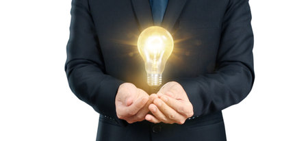 Hand of holding illuminated light bulb, idea, innovation inspiration concept ,business  idea