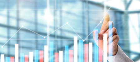 Businessman plan graph growth and increase of chart positive indicators in his business