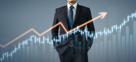 Businessman plan graph growth and increase of chart positive indicators in his businessの写真素材