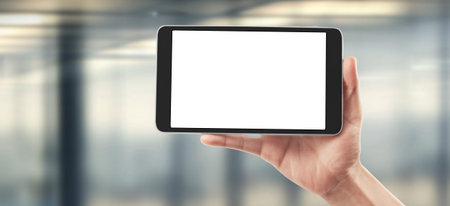 Hands holding a tablet touch computer gadget with isolated screen