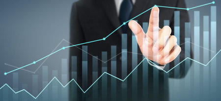 Businessman plan graph growth and increase of chart positive indicators in his business