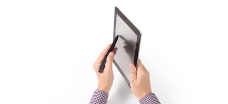 Hands holding a tablet touch computer gadget with isolated screen