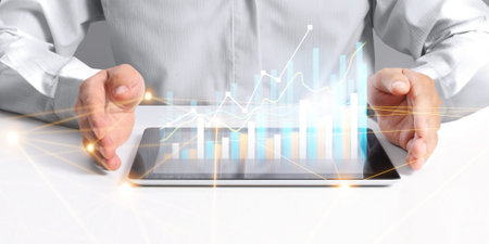 Businessman plan graph growth and increase of chart positive indicators in his business, tablet in...