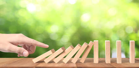 The Domino effect stopped by unique, Business Ideasの写真素材