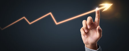 Businessman plan graph growth and increase of chart positive indicators in his business