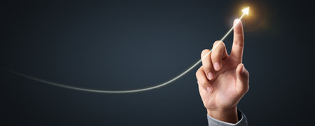 Businessman plan graph growth and increase of chart positive indicators in his businessの写真素材