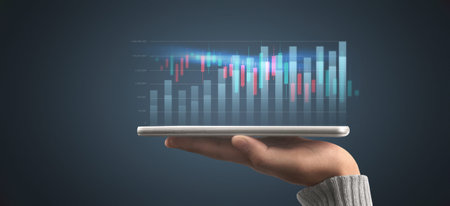 Businessman plan graph growth and increase of chart positive indicators in his business,tablet in...
