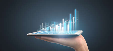 Hand holding smartphone device and touching screenの写真素材