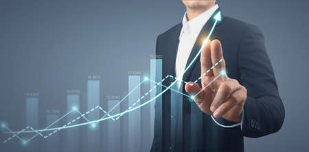 Businessman plan graph growth and increase of chart positive indicatorsの写真素材