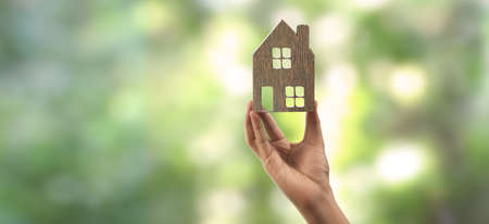 House Residential Structure in a hand ,business home ideaの写真素材