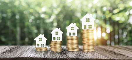 Model house mock up on coins. property real estate investmentの写真素材