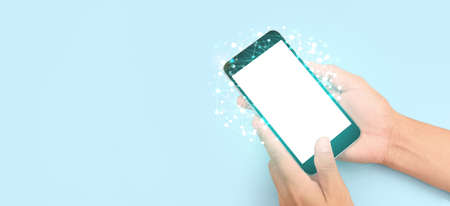 Hand holding smartphone device and touching screenの写真素材