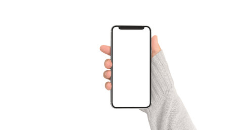 Hand holding smartphone device and touching screenの写真素材