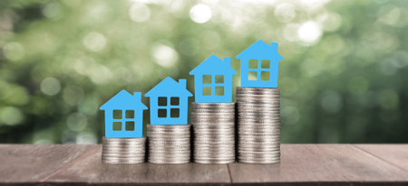 Model house mock up on coins. property real estate investmentの写真素材