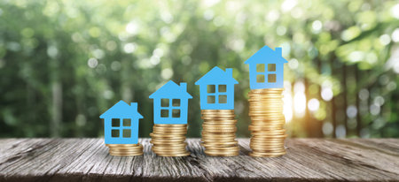 Model house mock up on coins. property real estate investmentの写真素材