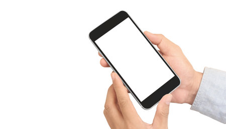 Hand holding smartphone device and touching screenの写真素材