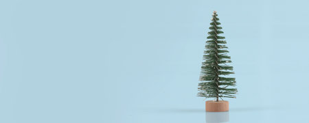 Small and lovely decorated artificial Christmas treeの写真素材