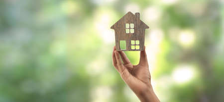 House Residential Structure in a hand ,business home ideaの写真素材