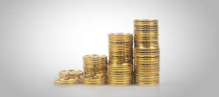 Stack of a coin with trading graph, financial investment conceptの写真素材