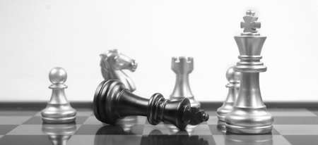 Chess board game concept of business ideas and competition and strategy concep and finance moneyの写真素材