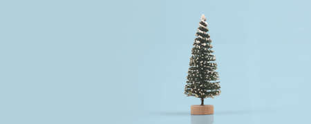 Small and lovely decorated artificial Christmas treeの写真素材