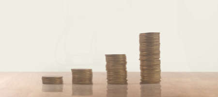 Stack of coin with trading graph, financial investment conceptの写真素材