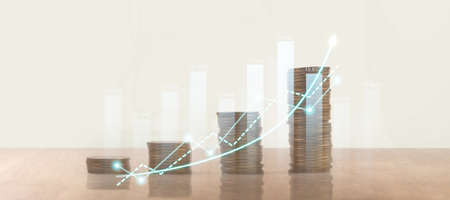 Stack of coin with trading graph, financial investment conceptの写真素材