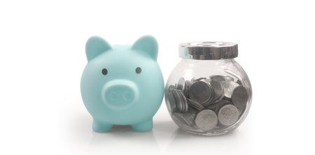 Coin with trading graph, financial investment concept and a Piggy bankの写真素材