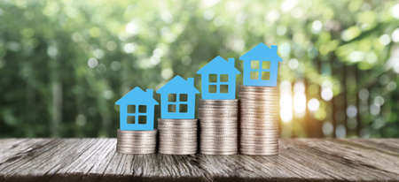Model house mock up on coins. property real estate investment coの写真素材