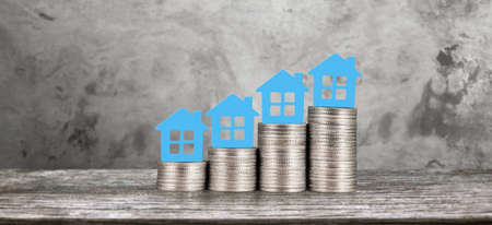 Model house mock up on coins. property real estate investment coの写真素材